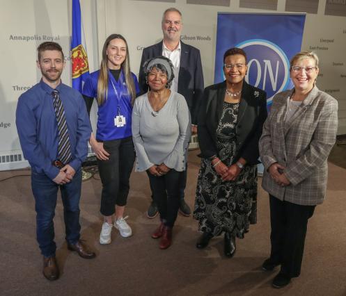 VON team poses with community members and government leaders at announcement