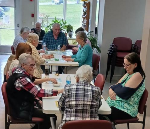 A group of people sitting at a table