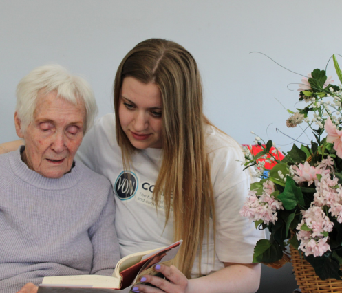 VON person reading to a client