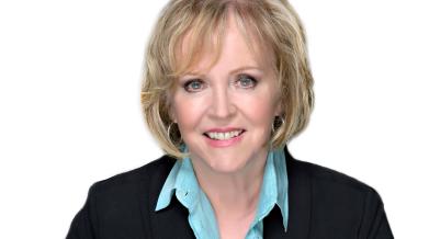 Headshot image of Jo-Anne Poirier wearing a turquoise blouse and black blazer 