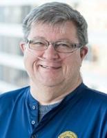 Headshot of Calvin Young, Client and Family Advisor