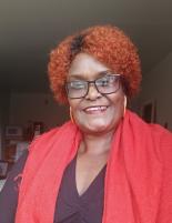 Head shot of Lydiah Migwi.